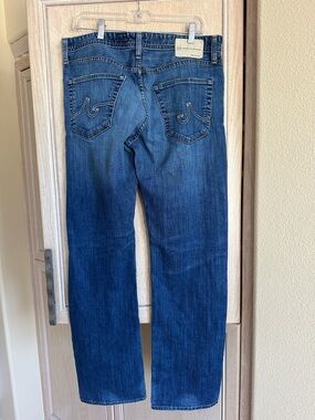 AG Dark Blue Straight Leg Jeans with Back Pocket Stitching